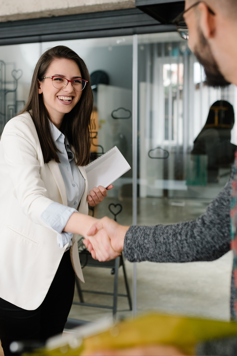 Country Club HR recruiter shaking hands with job candidate